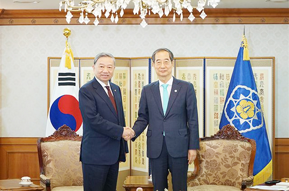 Bộ trưởng Tô Lâm và Thủ tướng Hàn Quốc Han Duck Soo - Ảnh: Cổng TTĐT Bộ Công an


