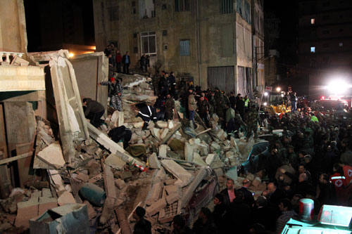   Hiện trường vụ sập chung cư tại Beirut - Ảnh: AFP