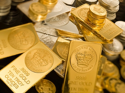 Giá vàng thế giới giảm sau khi Cộng Hòa Síp thông qua gói cứu trợ tài chính. Ảnh: Reuters.