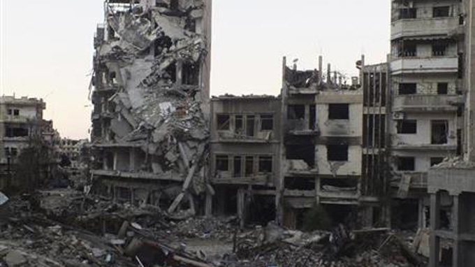 khung cảnh hoang tàn tại thành phố Homs, Syria ngày 19-10-2013. Ảnh: Reuters