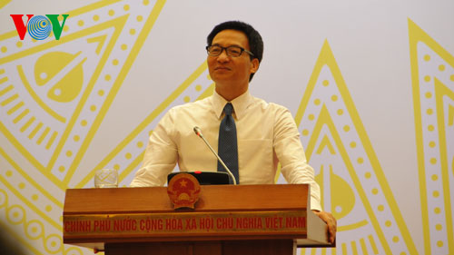 Bộ trưởng Vũ Đức Đam tại một buổi họp báo Chính phủ (ảnh Quang Trung)
