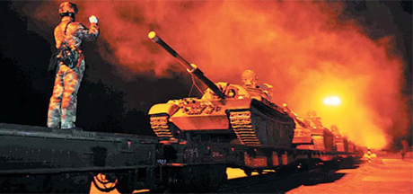 Một đoàn tàu chở các xe tăng Trung Quốc tới núi Baekdu để tham gia các cuộc tập trận ngày 6/12.