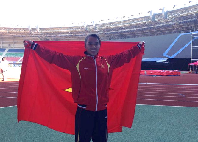 Phạm Thị Bình là VĐV đoạt HCV đầu tiên cho điền kinh Việt Nam tại SEA Games 27 - Ảnh: Khánh Uyên