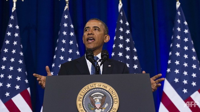  Tổng thống Barack Obama phát biểu tại trụ sở Bộ tư pháp Mỹ ở Washington, DC hôm 18-1 - Ảnh:AFP