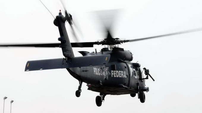  Một chiếc trực thăng của Mexico - Ảnh: AFP