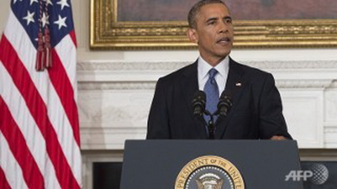 Tổng thống Mỹ Obama tuyên bố cho phép các cuộc không kích trên đất Iraq - Ảnh: AFP