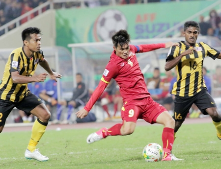  Trận Việt Nam - Malaysia trên sân Mỹ Đình là trận đấu kịch tính thứ nhì tại AFF Cup 2014, theo bình chọn của ESPN (ảnh: Gia Hưng)