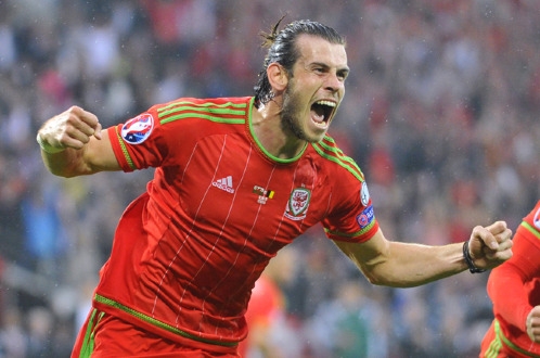  Niềm vui của Gareth Bale sau khi ghi bàn cho Xứ Wales. Ảnh: Reuters    