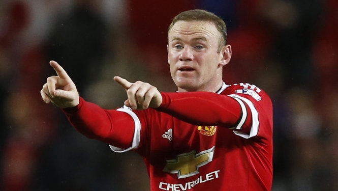 Niềm vui của Rooney sau khi mở tỉ số cho M.U. Ảnh: Reuters