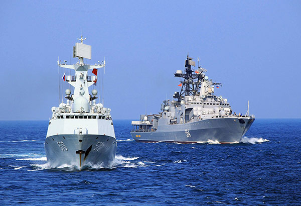 Tàu chiến Trung Quốc và Nga tập trận ngoài khơi vùng biển tỉnh Quảng Đông ngày 16-9 - Ảnh: Reuters