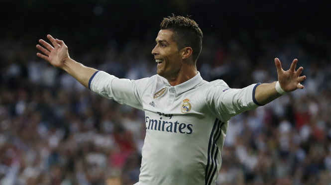 Niềm vui của Ronaldo sau khi mở tỉ số cho R.M. Ảnh: REUTERS