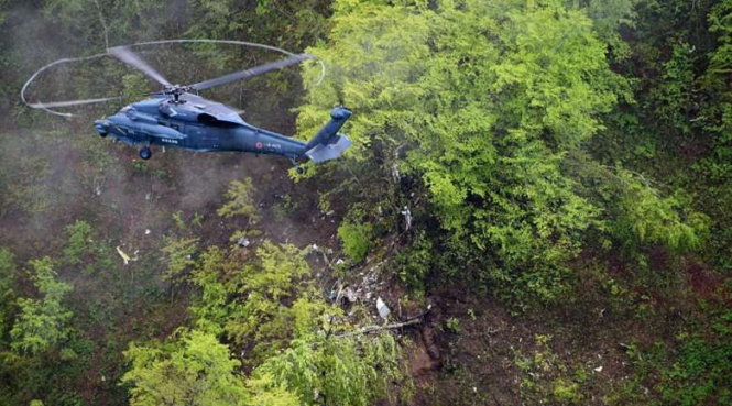 Nơi máy bay rơi là vùng rừng núi hiểm trở - Ảnh: GSDF