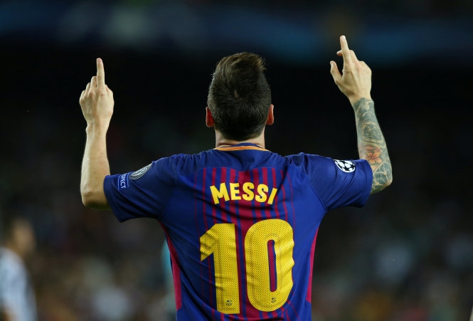 Messi ăn mừng bàn nâng tỉ số lên 3-0 cho Barca. Ảnh: REUTERS