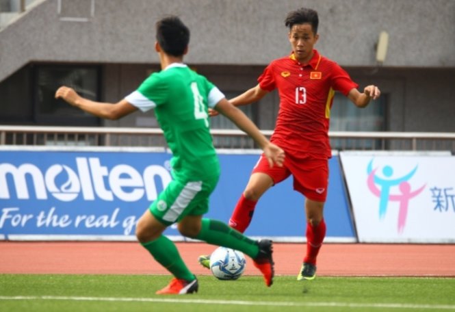 U-19 VN (áo đỏ) trong trận thắng Macau. Ảnh: AFC