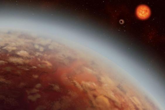 Hình ảnh minh họa về K2-18b, K2-18c và sao lùn đỏ K2-18. (Ảnh: Independent)