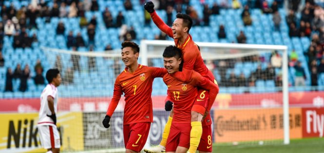 Các cầu thủ Trung Quốc ăn mừng bàn thắng vào lưới Oman. Ảnh: AFC