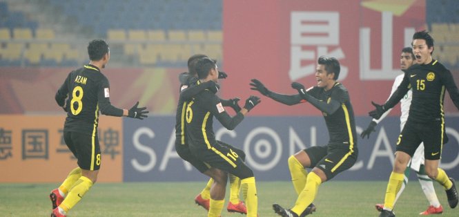 Niềm vui của các cầu thủ U-23 Malaysia sau khi ghi bàn vào lưới U-23 Saudi Arabia. Ảnh: AFC