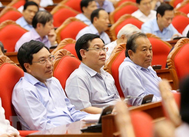 Phó Thủ tướng Vương Đình Huệ (giữa), Trưởng ban chỉ đạo đề án Cải cách chính sách tiền lương. Ảnh: TTXVN