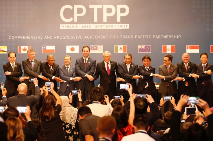 11 quốc gia ký kết CPTPP tại Santiago (Chile) ngày 8-3. Ảnh minh họa: Reuters