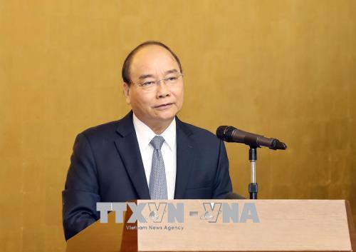 Thủ tướng Nguyễn Xuân Phúc phát biểu tại buổi gặp mặt. Ảnh: Thống Nhất/TTXVN