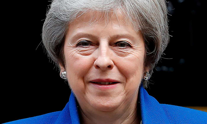 Thủ tướng Theresa May sẽ đối mặt thách thức không nhỏ để dự thảo thỏa thuận Brexit được thông qua tại nội các và quốc hội. Ảnh: AFP/Getty.