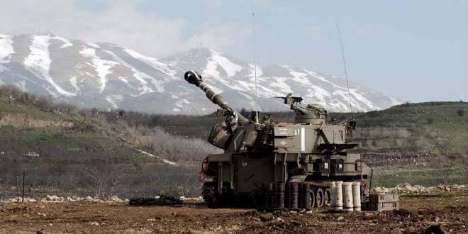 Xe tăng IDF bắn pháo cảnh cáo quân đội Syria tại Cao nguyên Golan. Ảnh: IDF Spokesperson’s Unit