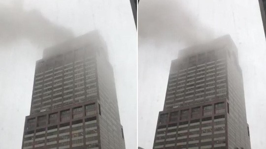  Nóc tòa nhà bóc cháy sau khi trực thăng rơi. Ảnh: Lance Koonce
