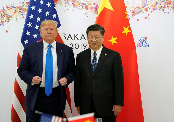 Tổng thống Donald Trump và Chủ tịch Tập Cận Bình chụp ảnh chung khi tham dự Hội nghị thượng đỉnh G20 - nhóm 20 nền kinh tế phát triển và mới nổi hàng đầu thế giới - tại Nhật Bản hồi cuối tháng 6. Ảnh: Reuters