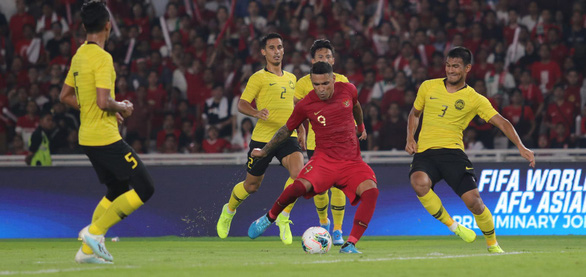 Malaysia (aáo vàng) đã có trận ra quân thành công trước Indonesia - Ảnh: AFC