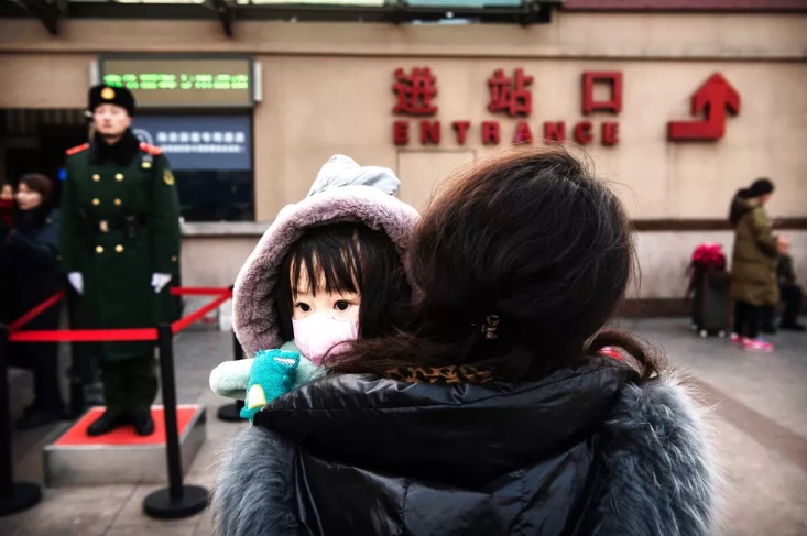 Tại Bắc Kinh, Trung Quốc, người dân được khuyến cáo đeo khẩu trang để phòng ngừa virus nCoV
