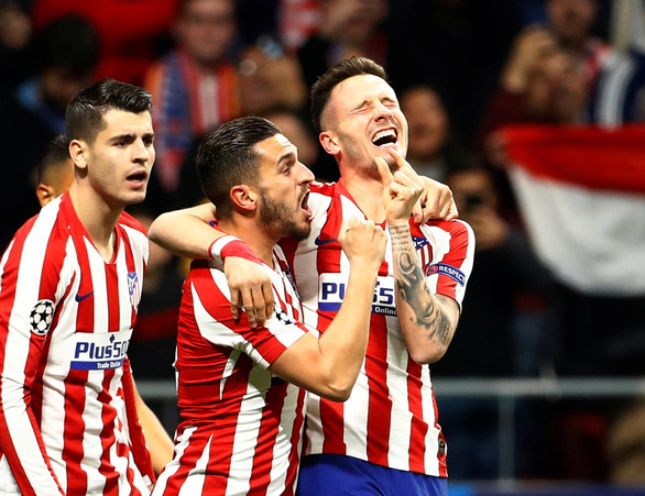 Niềm vui của các cầu thủ Atletico Madrid sau khi ghi bàn vào lưới Liverpool - Ảnh: REUTERS