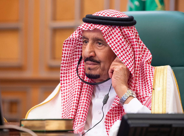 Quốc vương Salman bin Abdulaziz Al Saud của Saudi Arabia chủ trì cuộc họp trực tuyến của G20 ngày 26-3 - Ảnh: REUTERS