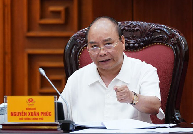 Thủ tướng Nguyễn Xuân Phúc phát biểu tại cuộc họp. Ảnh: VGP/Quang Hiếu.