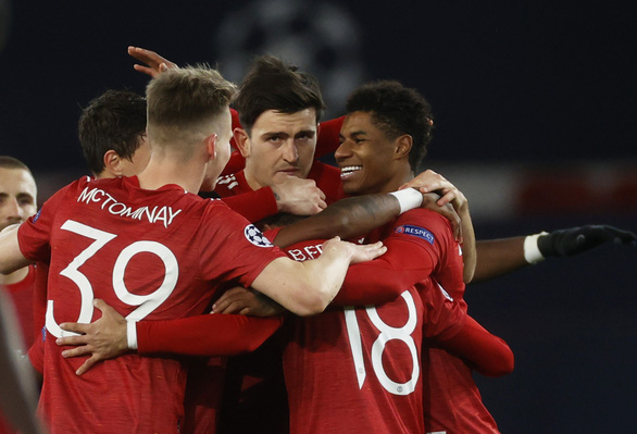 Khoảnh khắc Rashford ghi bàn thứ 2 cho Man United - Ảnh: REUTERS