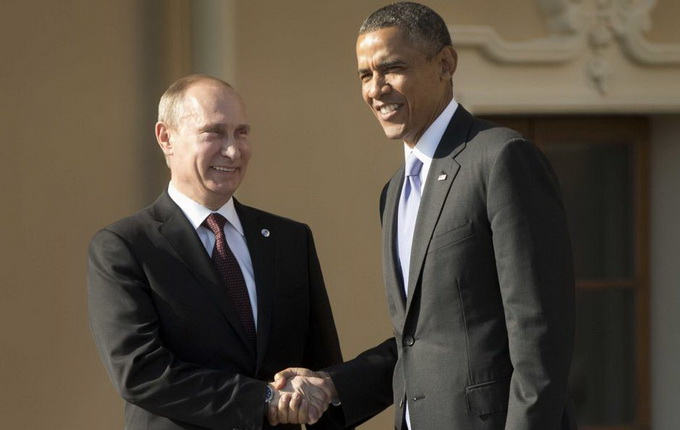 Tổng thống Nga V.Putin bắt tay với Tổng thống Mỹ B.Obama tại hội nghị G20 ngày 5-9 - Ảnh: AFP