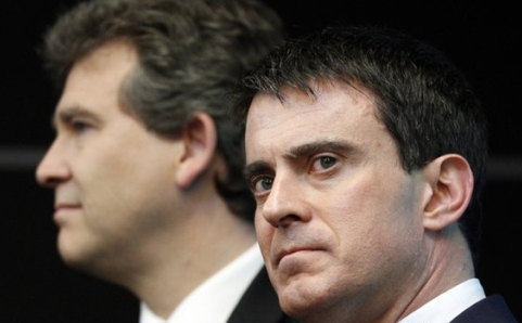 Thủ tướng Pháp Manuel Valls (phải) (Ảnh AP)