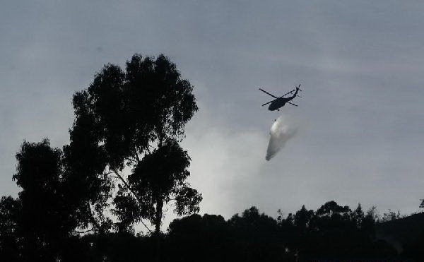  Một trực thăng tham gia tìm kiếm cứu hộ sau khi máy bay chở 10 người mất tích và được cho là bị rơi ở miền nam Colombia - Ảnh: news.cn