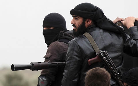  Các tay súng thuộc lực lương nổi dậy thân al-Qaeda ở Syria (Ảnh AFP)