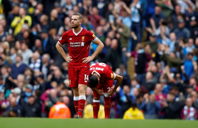  Nỗi thất vọng của Henderson sau khi Liverpool bị Sevilla cầm chân 2-2. Ảnh: REUTERS