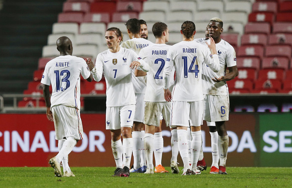 Các cầu thủ tuyển Pháp có chiến thắng quan trọng trước Bồ Đào Nha - Ảnh: REUTERS