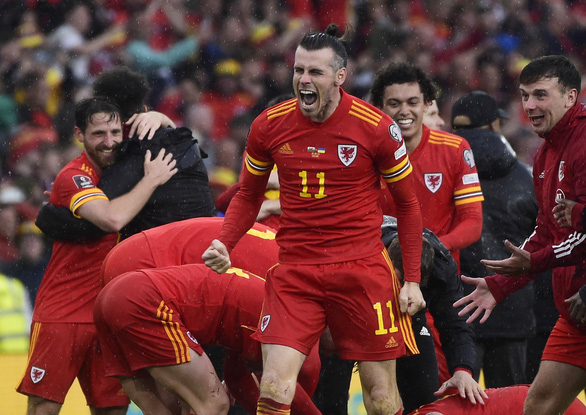  Niềm vui của Gareth Bale và đồng đội - Ảnh: REUTERS